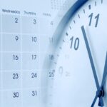 A close-up of a wall clock showing 11:55, overlaid on a monthly calendar, highlights the urgency—You Only Have 15 Days to File a WV Grievance & Here’s Why a Lawyer Helps with crucial time management.