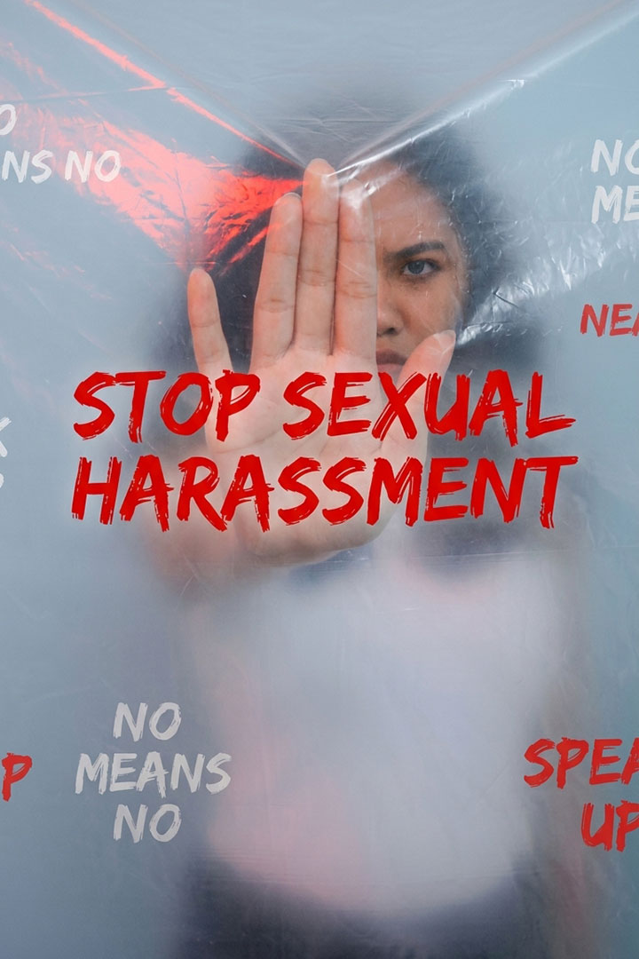 A person holds their hand up in a stop gesture behind transparent plastic. Bold red text reads "STOP SEXUAL HARASSMENT." Surrounding messages say "NO MEANS NO" and "SPEAK UP.