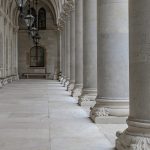 Row of classic stone columns at a courthouse