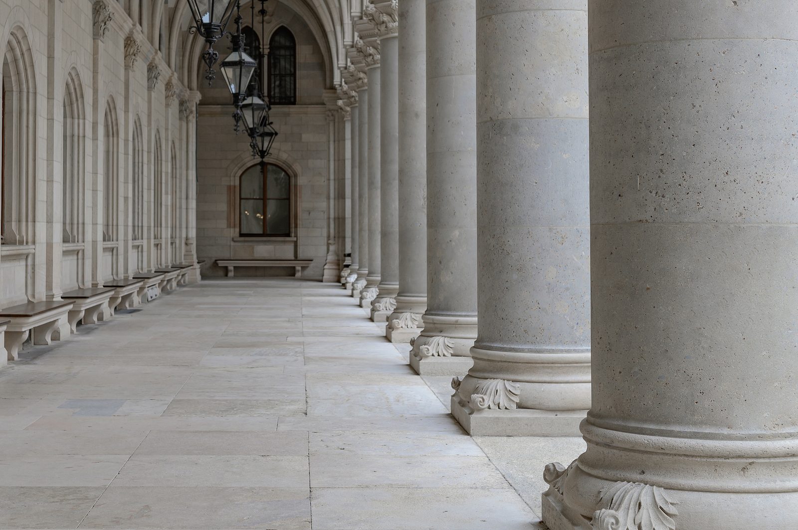 Row of classic stone columns at a courthouse