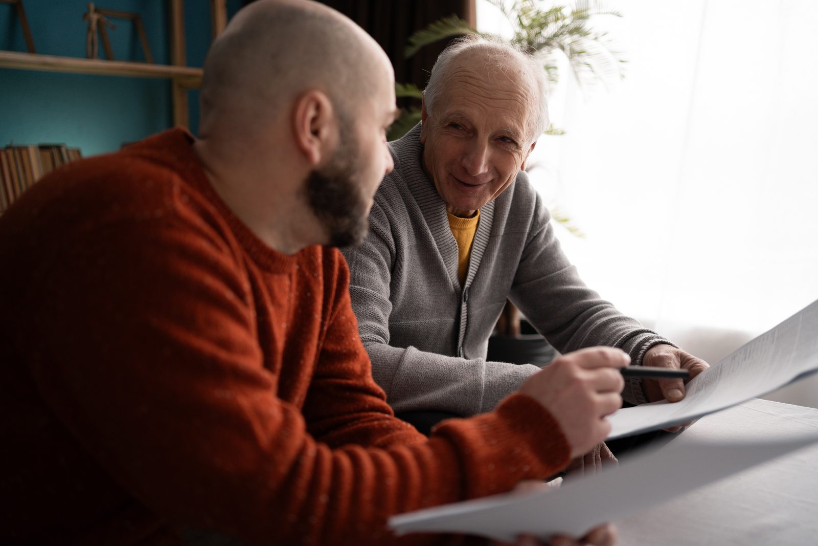 Parent reviewing legal paperwork with an advisor