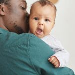 Father holding his newborn baby