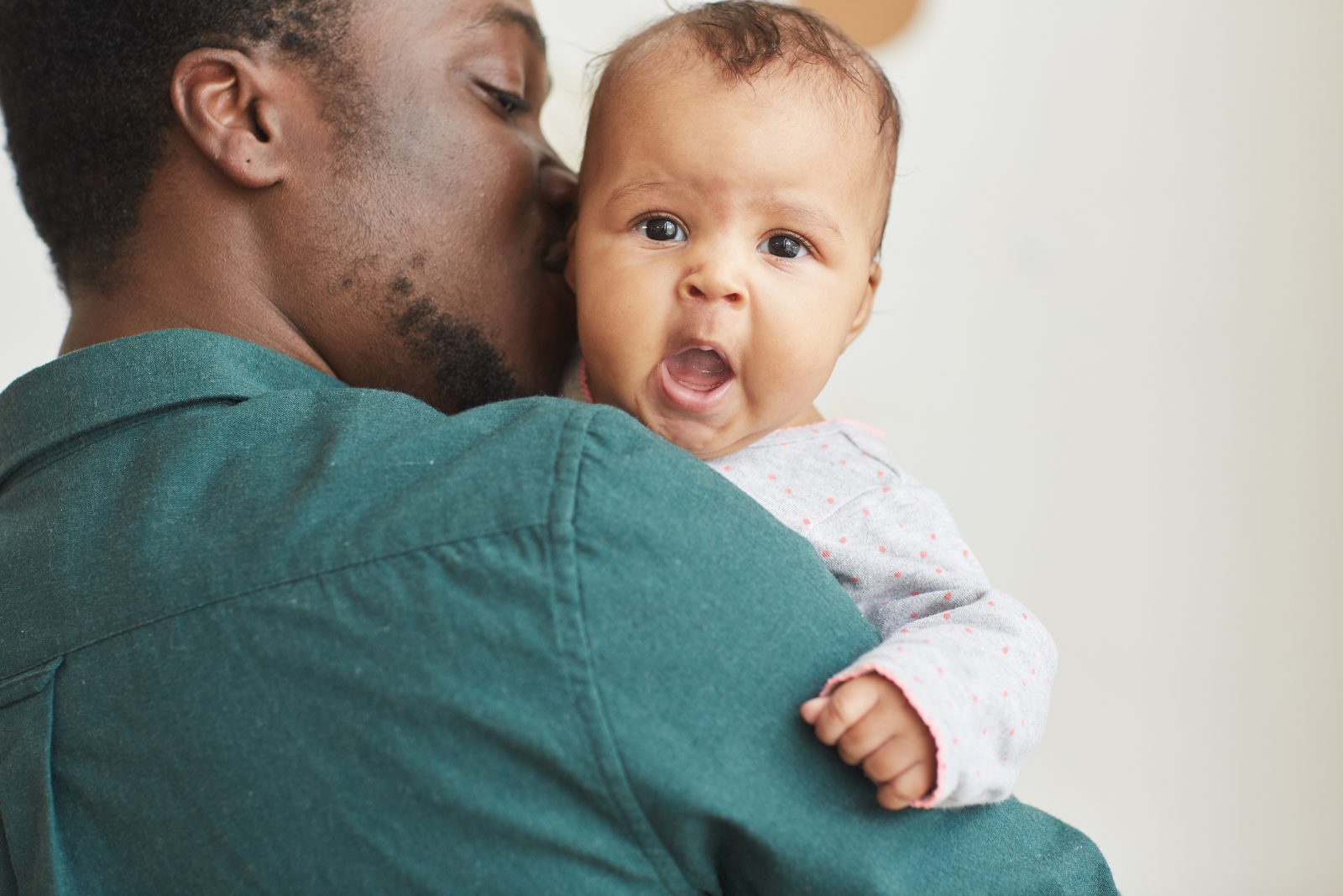 Father holding his newborn baby