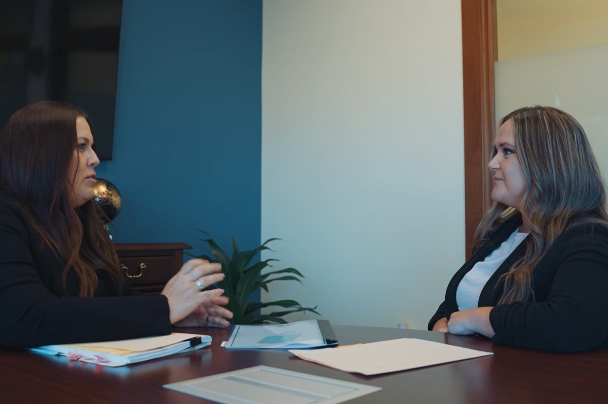 Personal injury consultation Attorney meeting with a client at the Klie Law Offices conference table